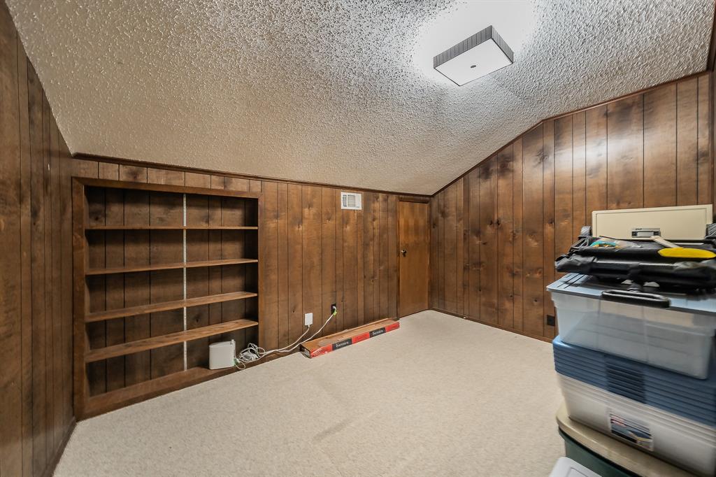 2003 Edgebrook Court Arlington, TX 76015 - Photo 38 of 40 a bedroom with a bed and a closet