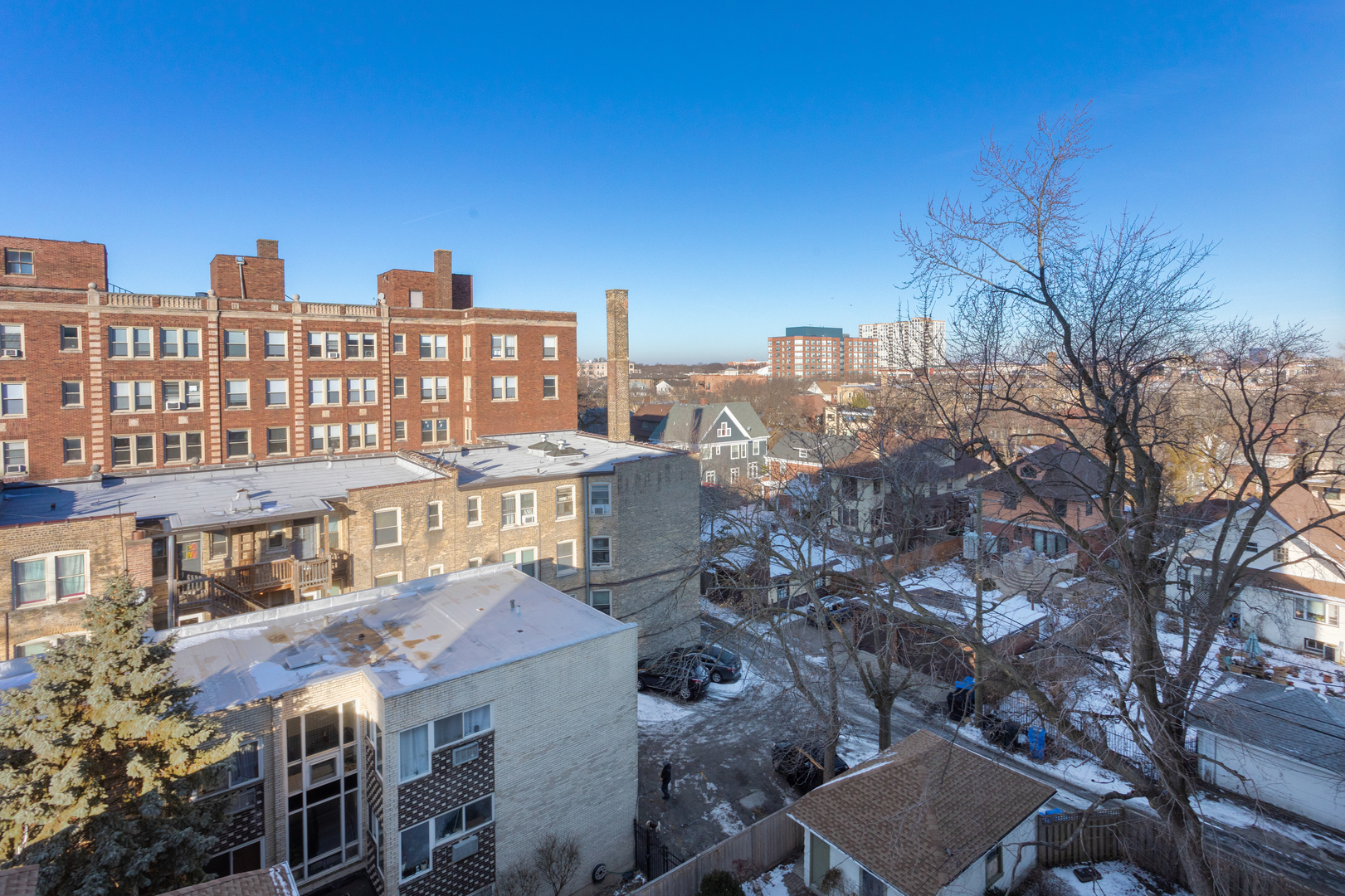 1608 West Sherwin Avenue, Unit 705 Chicago, IL 60626 - Photo 6 of 10 a view of a city that has tall buildings