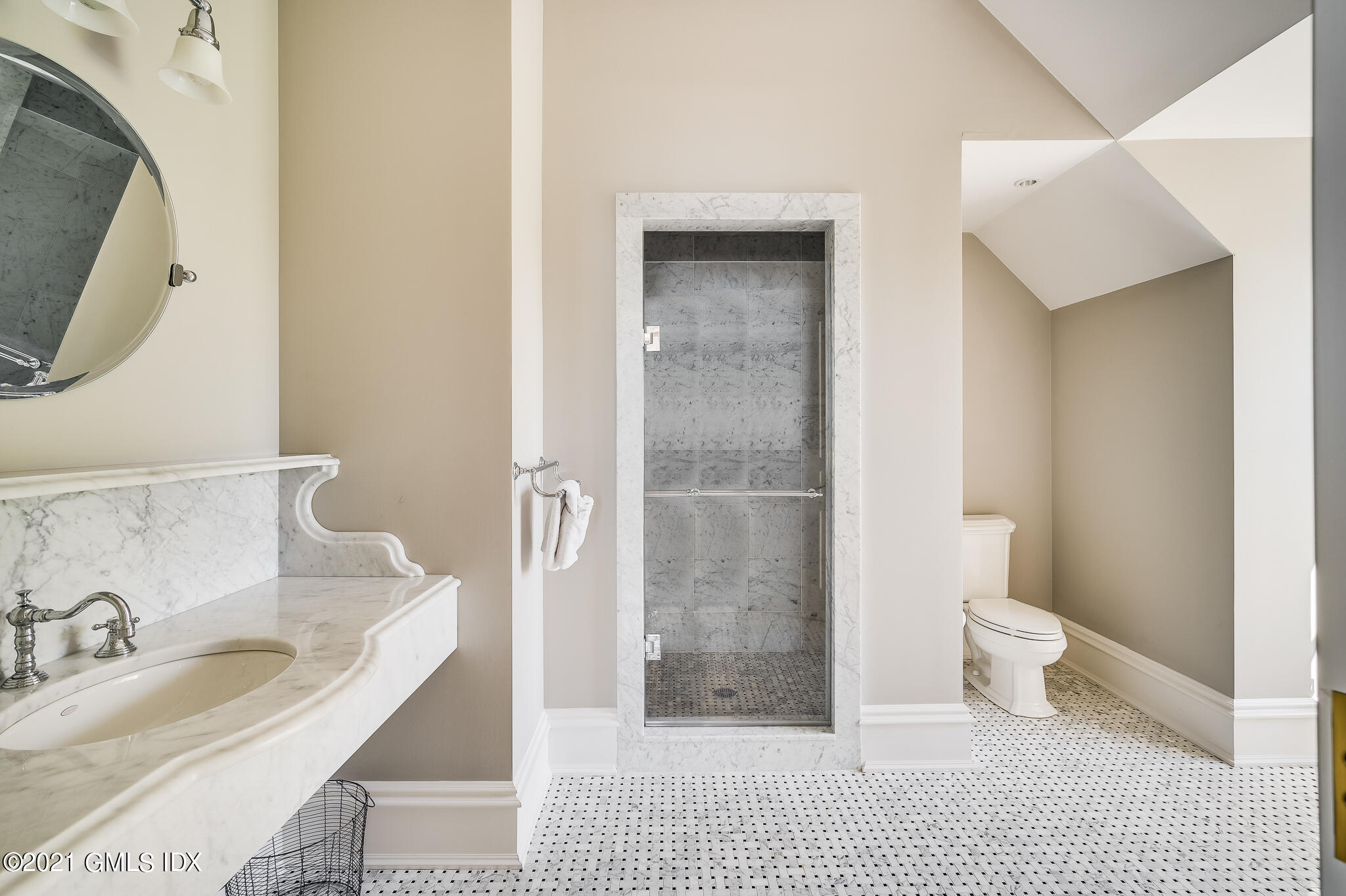 12 Valley Road Norwalk, CT 06854 - Photo 10 of 20 a bathroom with a sink and a toilet