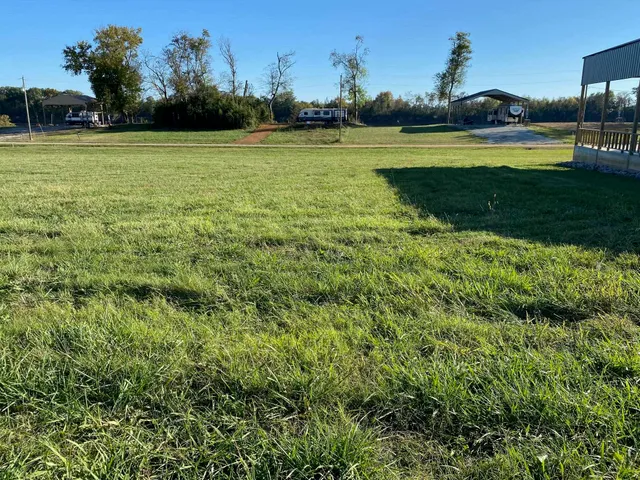 a view of outdoor space with deck and yard