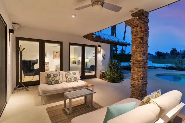 a view of a house with a swimming pool