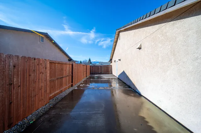 a view of balcony with wooden floor