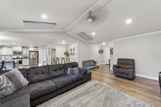 a living room with furniture and a couch