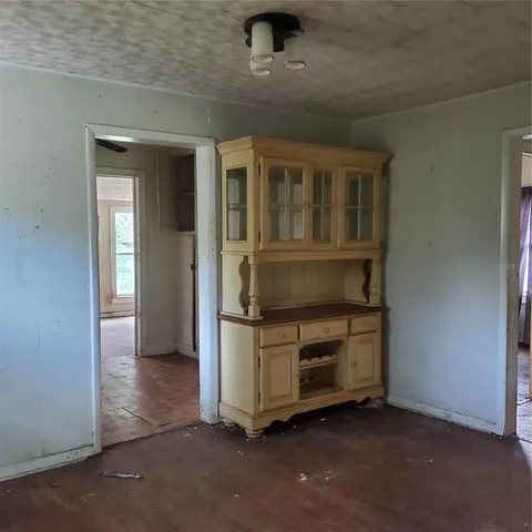 an entryway with a workspace