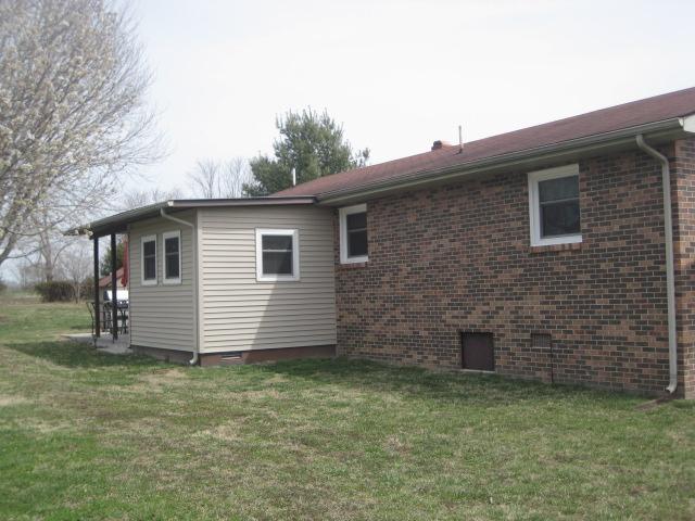 3451 Sainville Road Manchester, TN 37355 - Photo 2 of 20 Windows in this Brick Home were installed in October 2009 with DH54 - 5400 Double Hung Vinyl Frame, Vertical Slider Windows. Home has been very well maintained. The 11x10 Dining Room has a door leading out to Covered Patio.