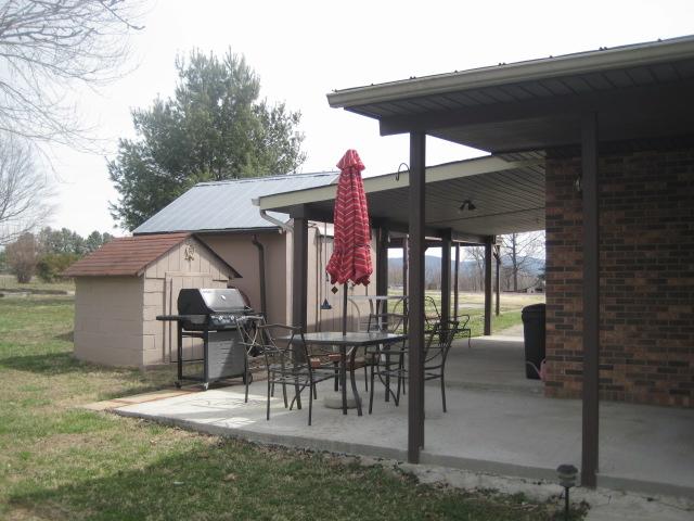 3451 Sainville Road Manchester, TN 37355 - Photo 6 of 20 Covered concrete patio is a great place for all those Family Cookouts.