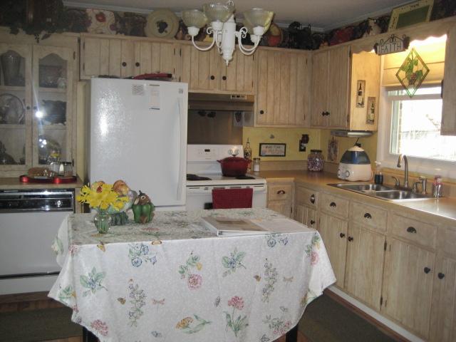 3451 Sainville Road Manchester, TN 37355 - Photo 9 of 20 Kitchen is 13x12. Kitchen cabinets have been refinished.