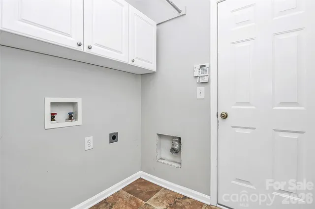 an empty room with a bathroom
