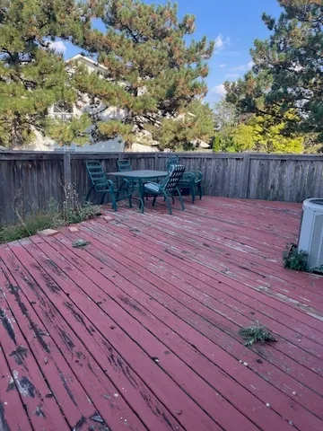 a yard with wooden fence