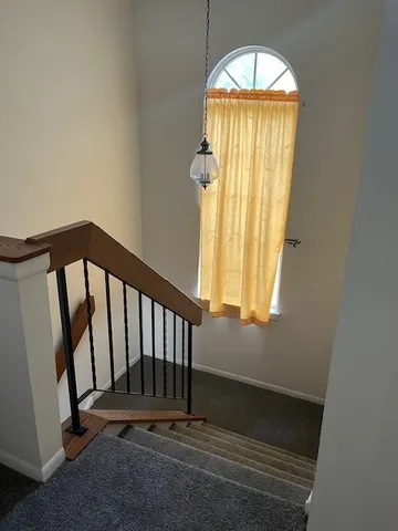 a view of entryway with a front door