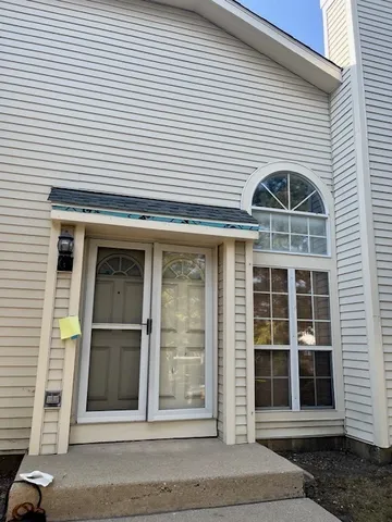 a front view of a house with a window