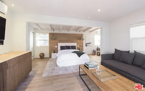 a living room with furniture and a couch