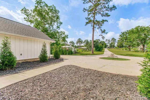 a kitchen with cabinets and stainless steel appliances