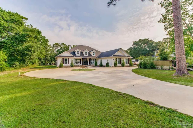 a house with garden in front of it