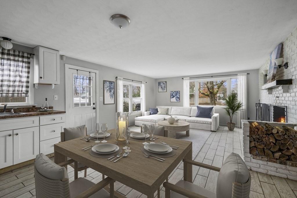 45 Burley Street Danvers, MA 01923 - Photo 14 of 41 a living room with furniture kitchen view and a window