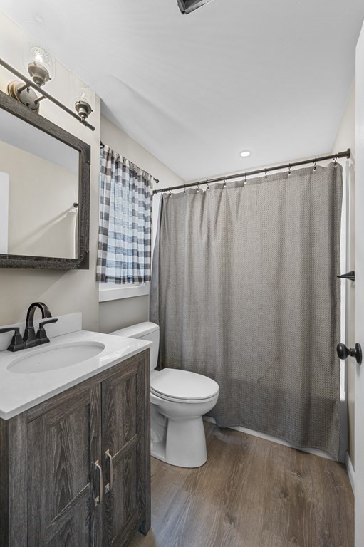 45 Burley Street Danvers, MA 01923 - Photo 17 of 41 a bathroom with a sink toilet and shower