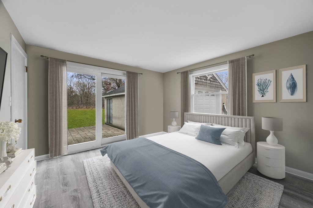 45 Burley Street Danvers, MA 01923 - Photo 18 of 41 a bedroom with a large bed and a window