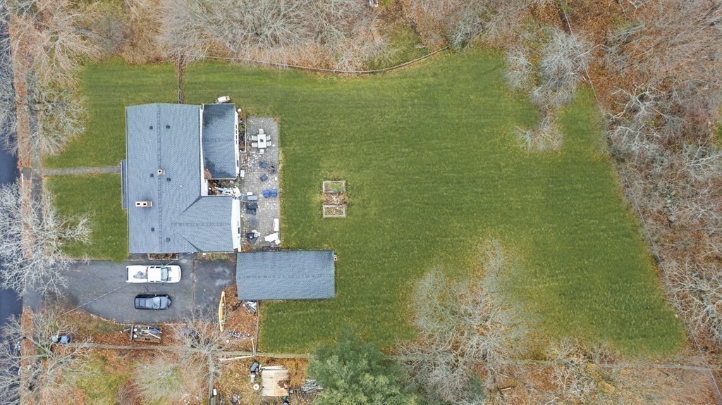 45 Burley Street Danvers, MA 01923 - Photo 35 of 41 an aerial view of a house with a yard