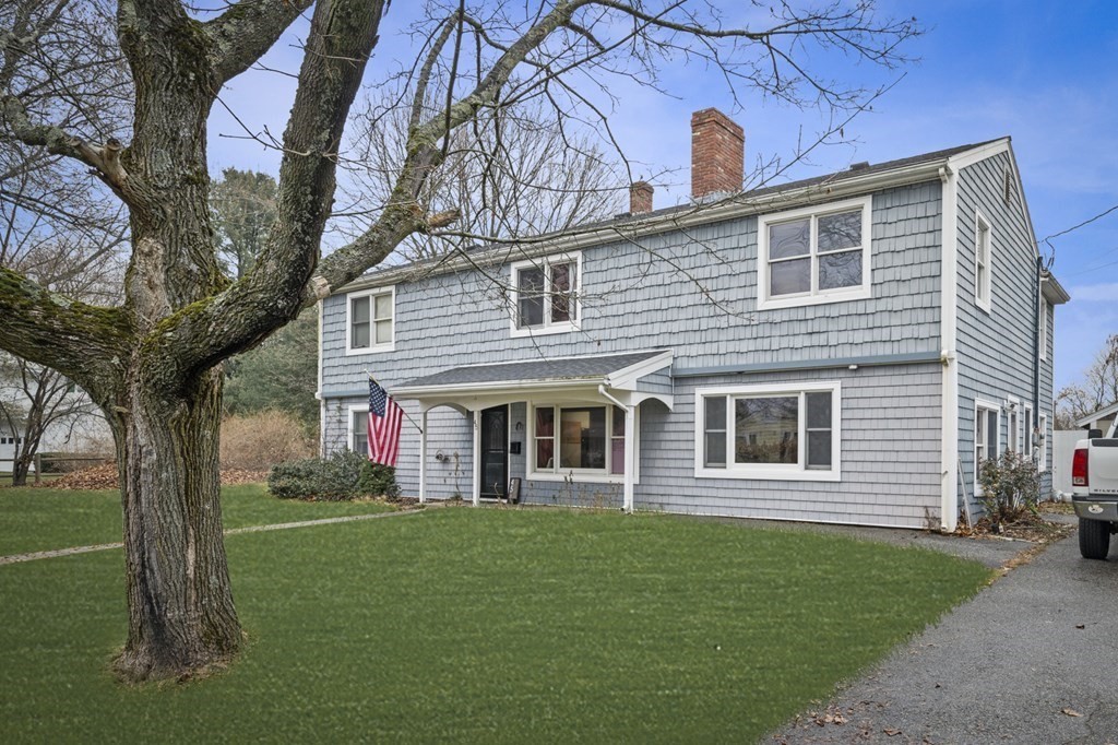 45 Burley Street Danvers, MA 01923 - Photo 4 of 41 a view of a house with a yard