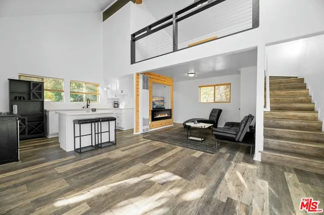 a kitchen with a sink cabinets and window