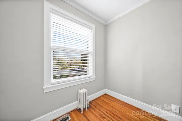 a view of a room with a window