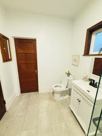 a bathroom with a bathtub sink and toilet