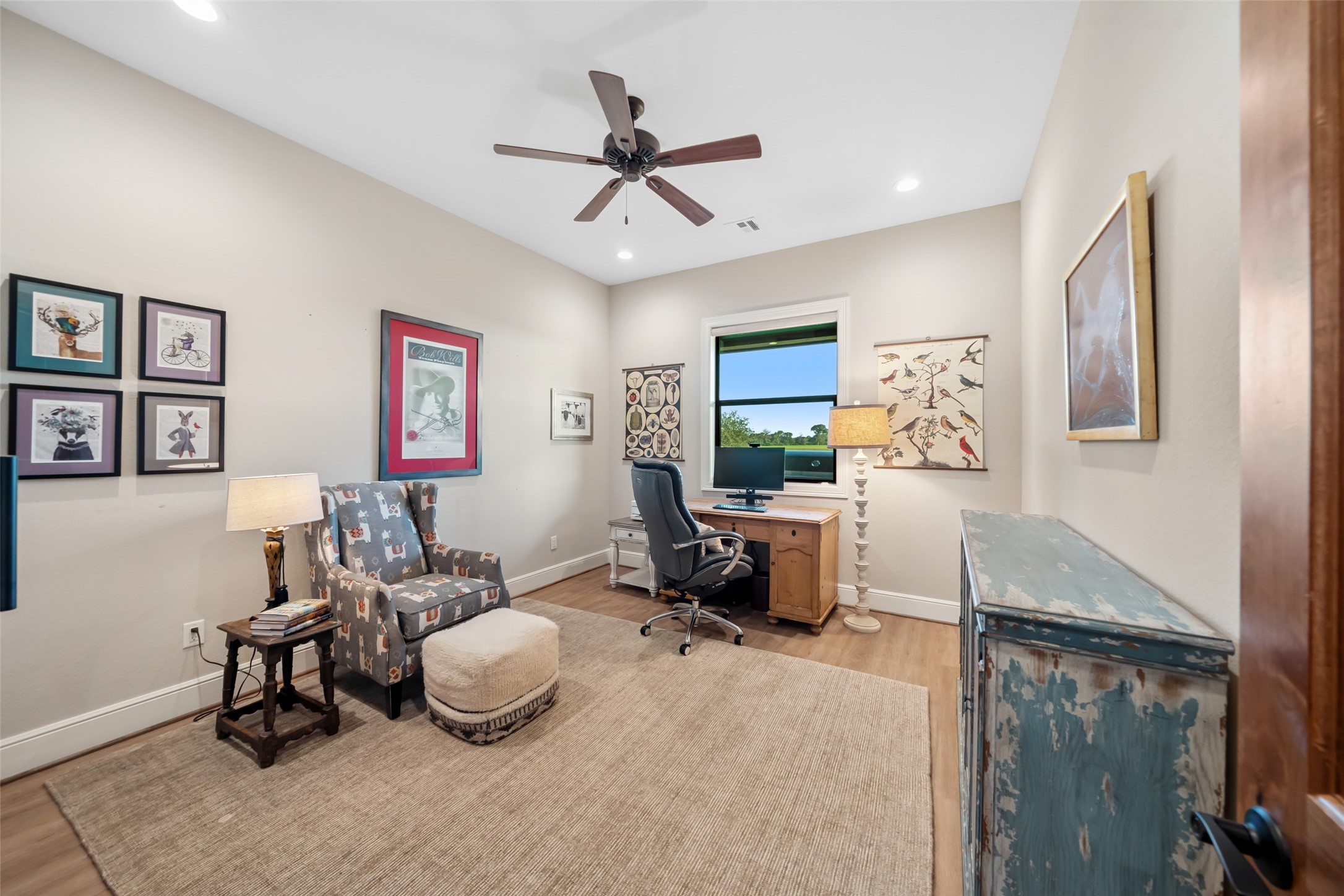 30163 High Spirit Ranch Road Hempstead, TX 77445 - Photo 27 of 47 This flexible third bedroom, currently
used as a study, features a large
window, overhead lighting, and
generous space for seating or
bedroom furnishings.