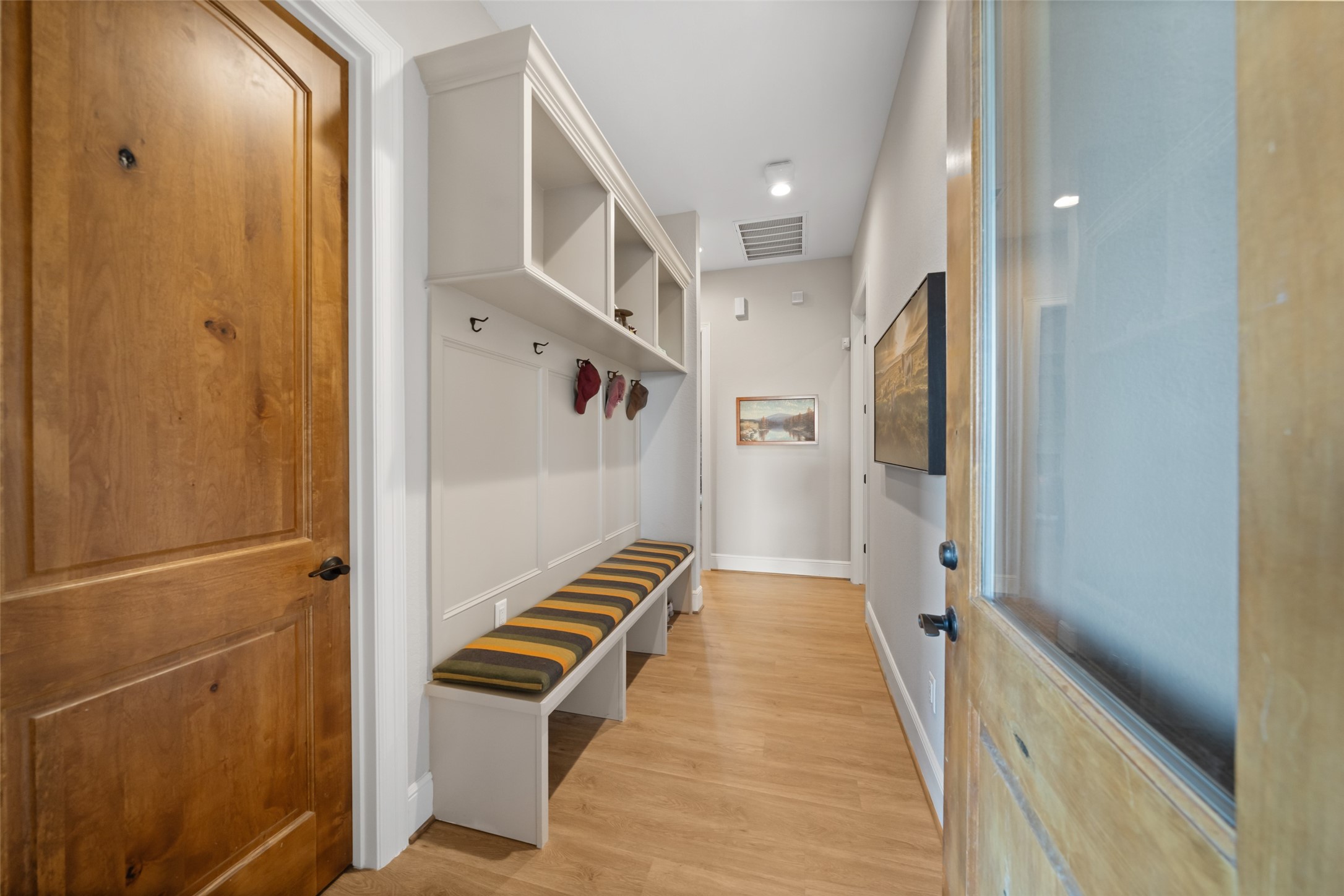 30163 High Spirit Ranch Road Hempstead, TX 77445 - Photo 29 of 47 Built-in cubbies, hooks, and a
cushioned bench provide smart,
efficient storage just inside the
home’s side entry—perfect for daily
comings and goings.