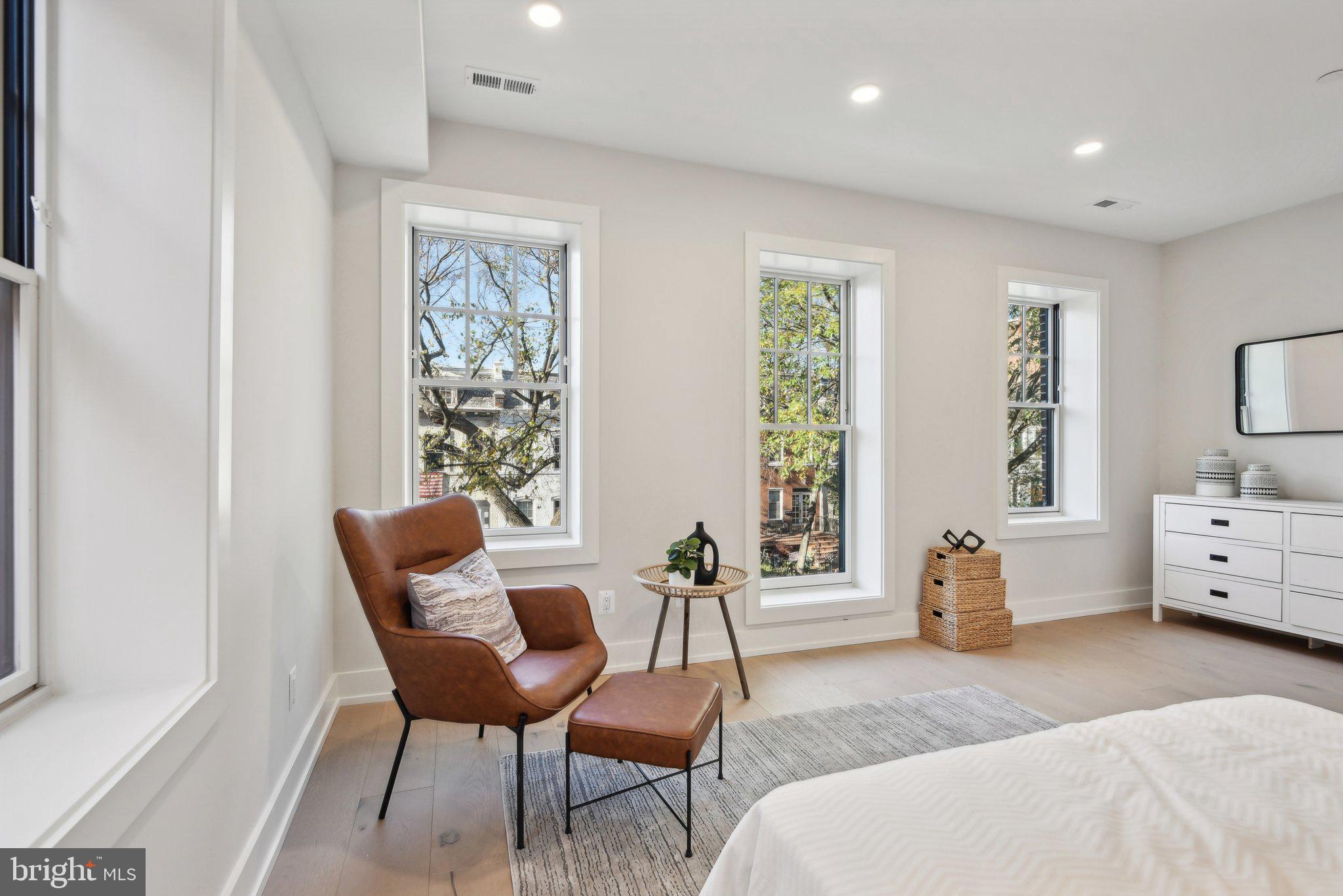 1748 Lanier Place Northwest, Unit 2 Washington, DC 20009 - Photo 12 of 33 a bedroom with furniture and windows