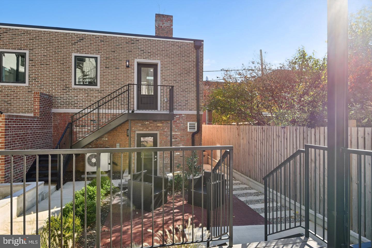 1748 Lanier Place Northwest, Unit 2 Washington, DC 20009 - Photo 21 of 33 a front view of a house with a yard