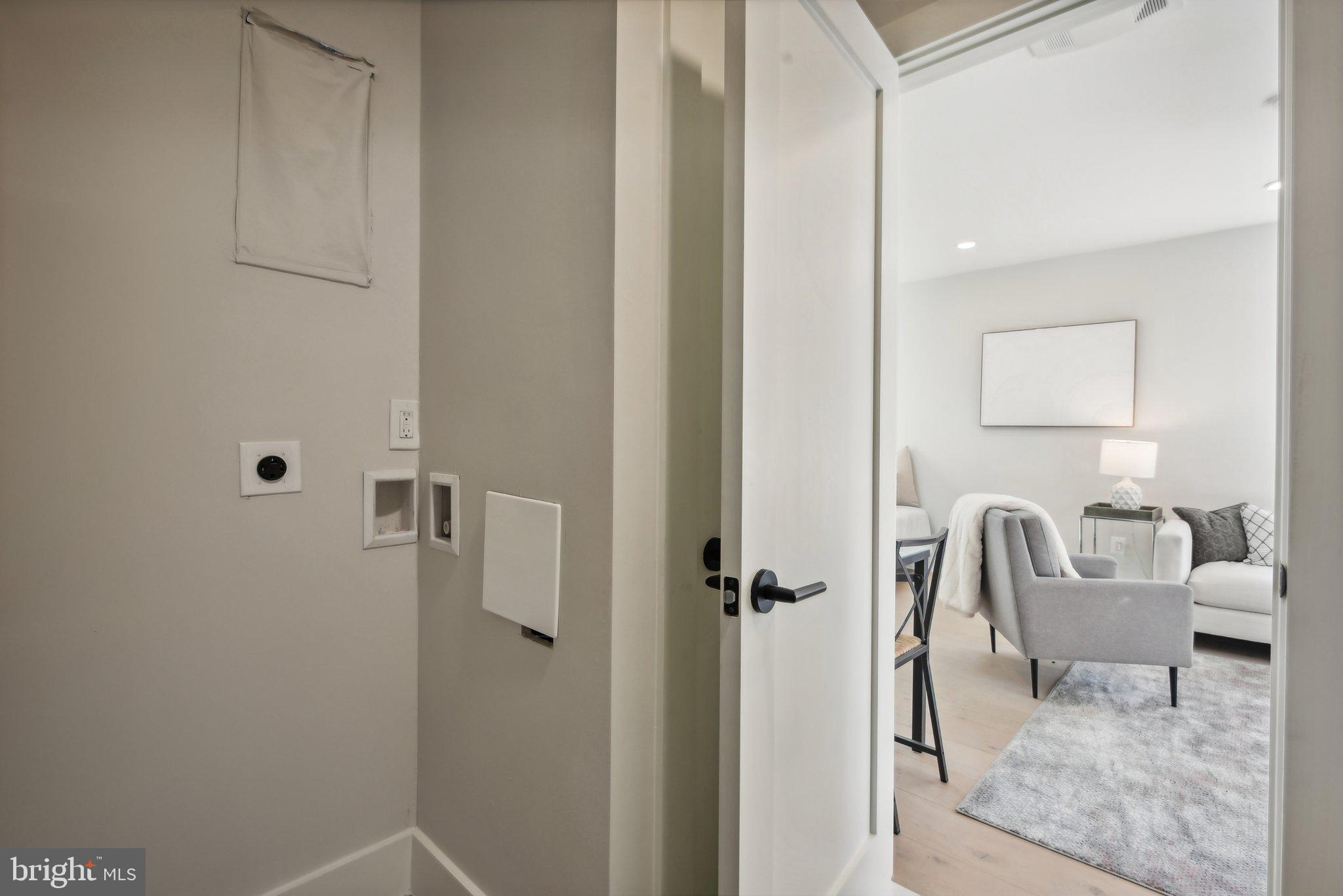 1748 Lanier Place Northwest, Unit 2 Washington, DC 20009 - Photo 26 of 33 a bathroom with a chair and the shower
