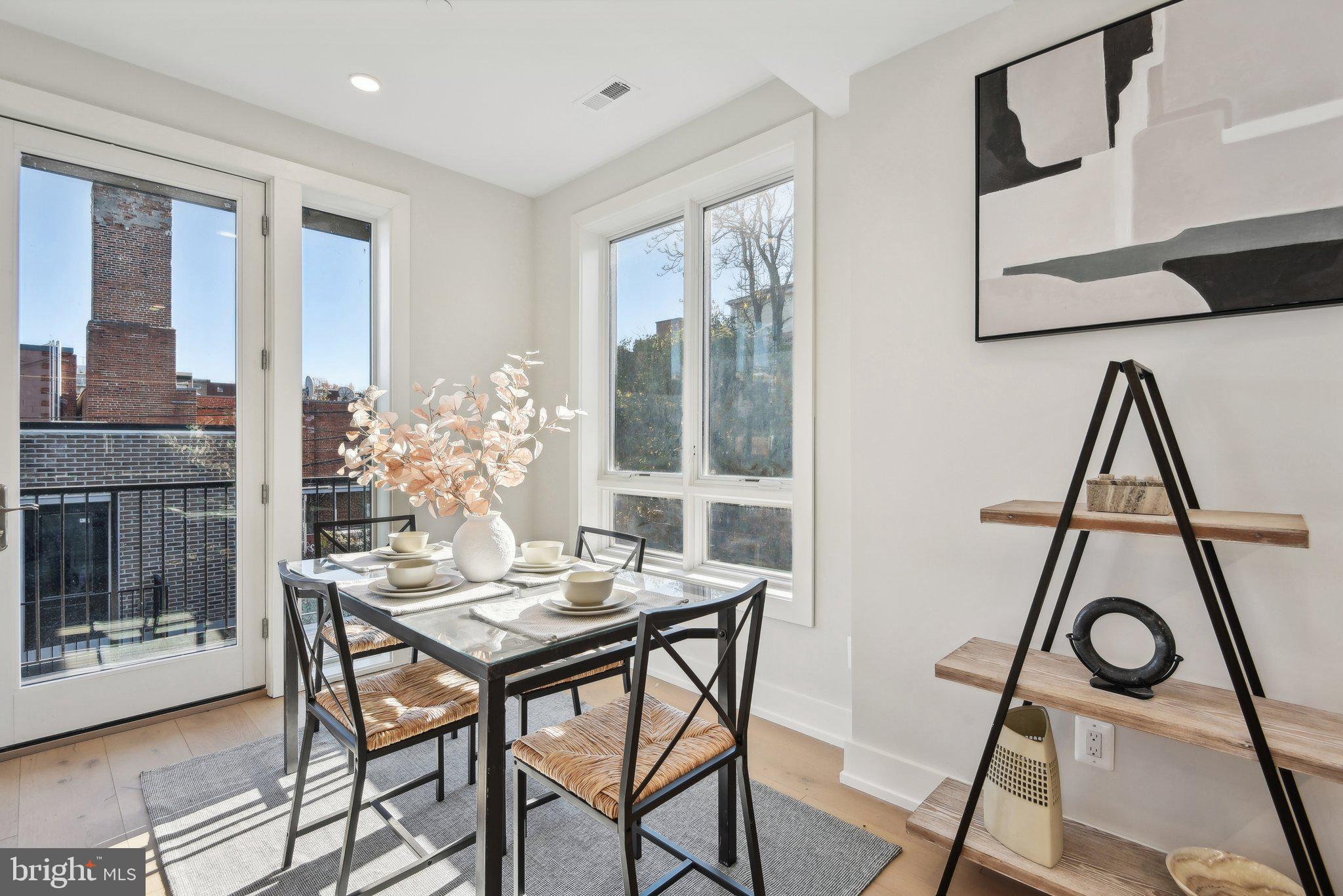 1748 Lanier Place Northwest, Unit 2 Washington, DC 20009 - Photo 5 of 33 a view of a workspace with furniture and window