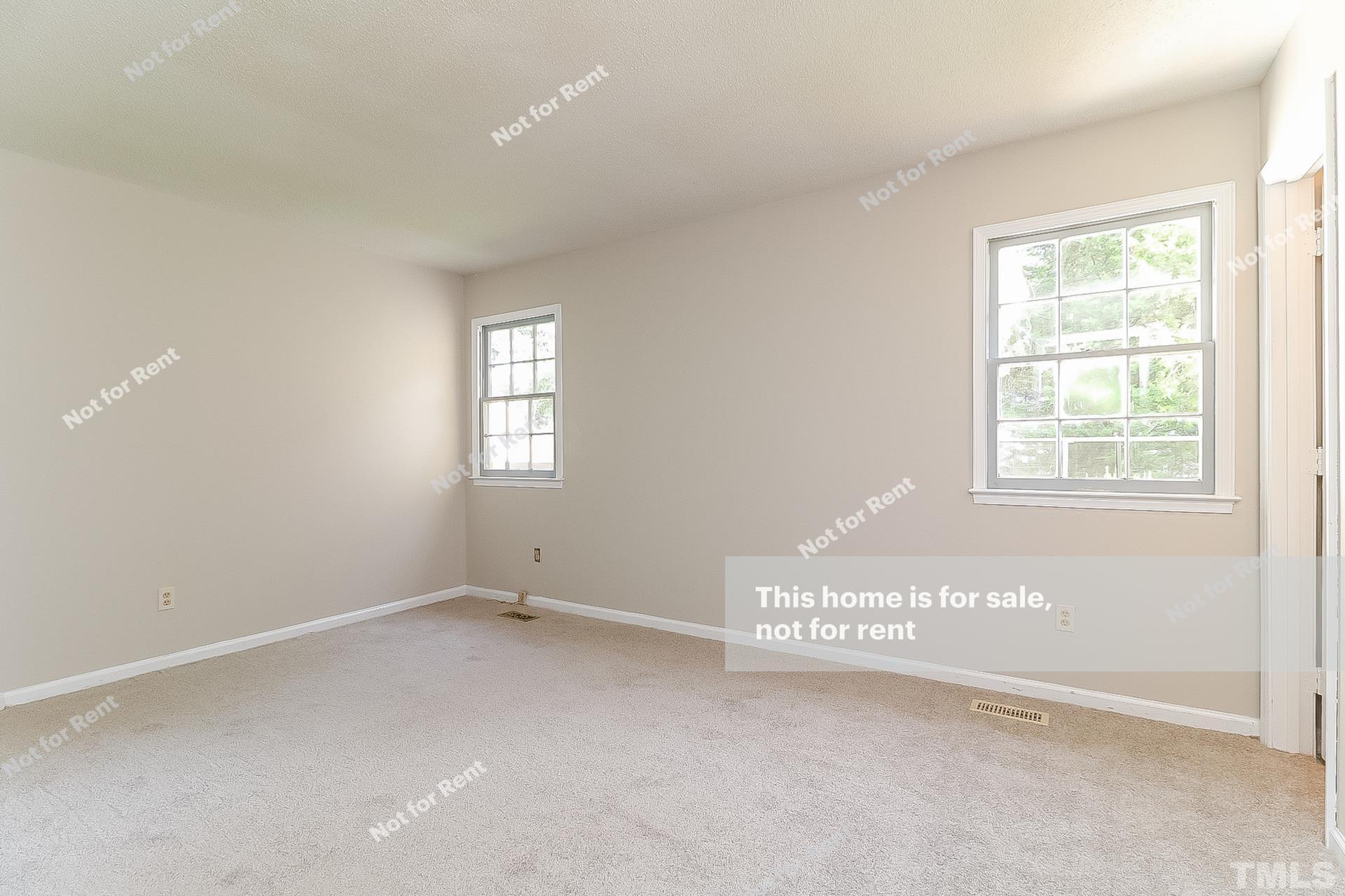 3729 Dusty Lane Raleigh, NC 27604 - Photo 15 of 27 an empty room with windows