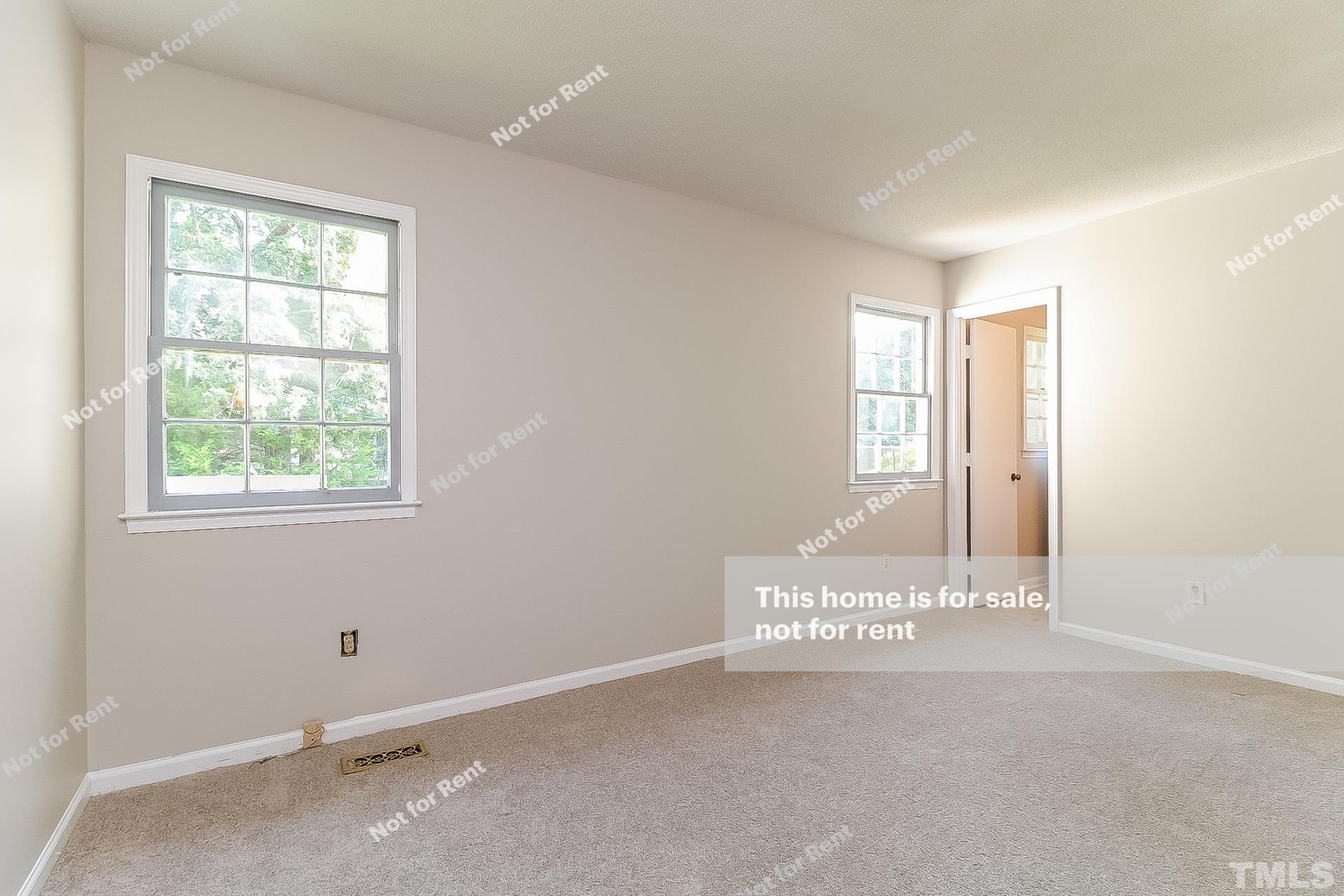 3729 Dusty Lane Raleigh, NC 27604 - Photo 16 of 27 an empty room with windows
