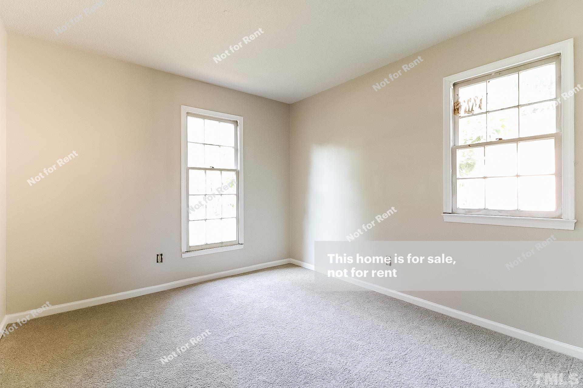3729 Dusty Lane Raleigh, NC 27604 - Photo 17 of 27 an empty room with windows