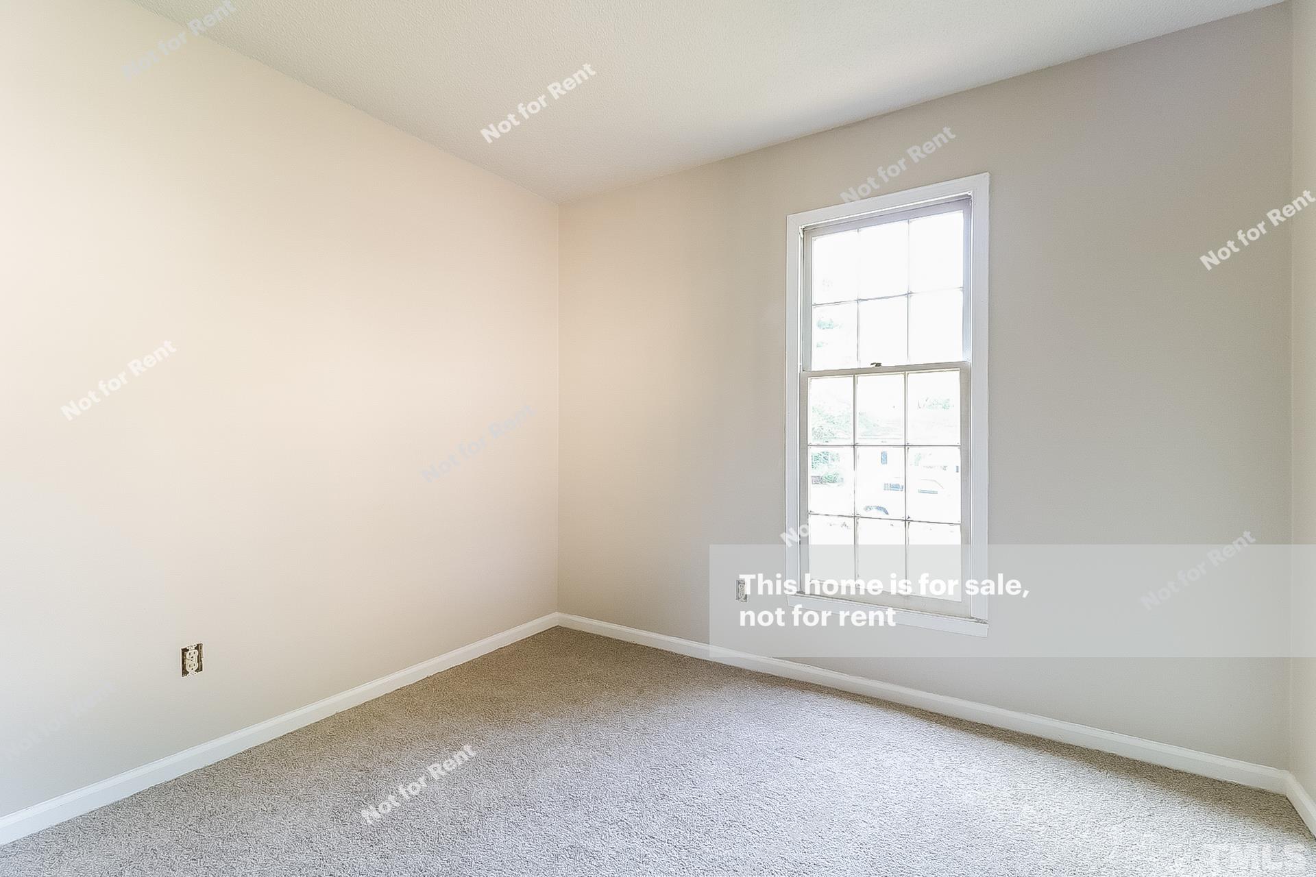 3729 Dusty Lane Raleigh, NC 27604 - Photo 18 of 27 an empty room with a window