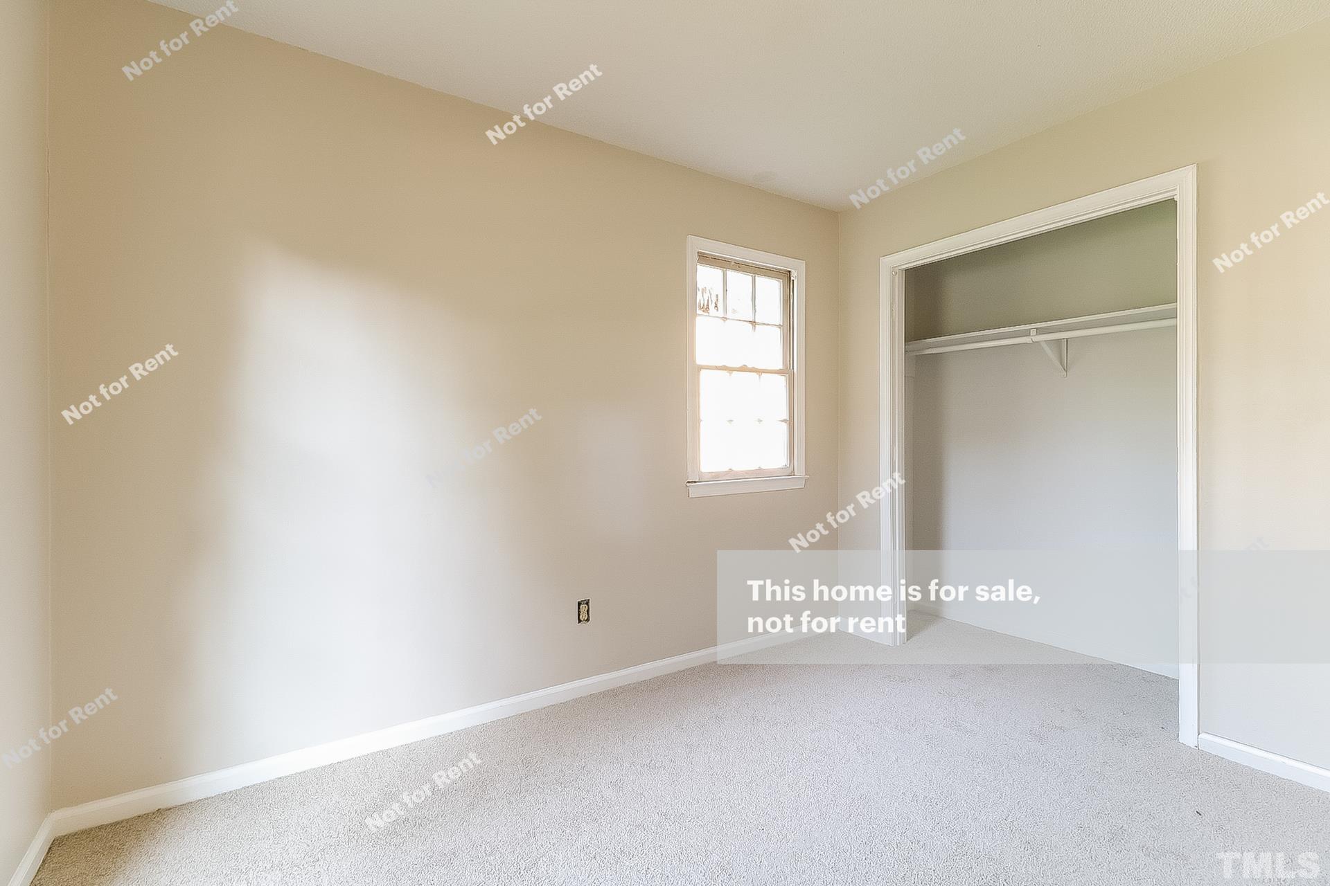 3729 Dusty Lane Raleigh, NC 27604 - Photo 19 of 27 an empty room with windows and closet