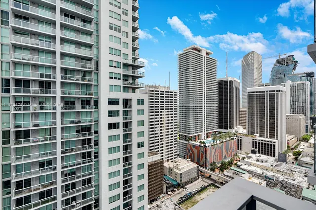 a view of a balcony with chairs