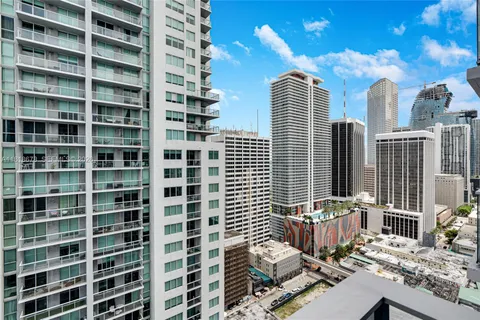 a view of a balcony with chairs