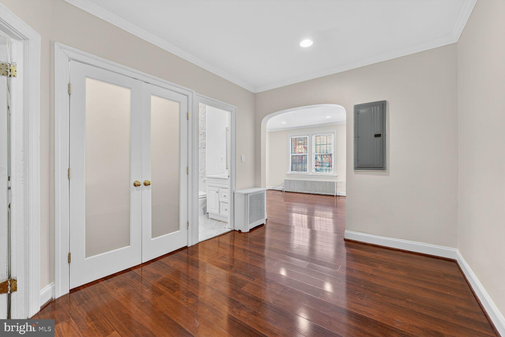 1618 18th Street Southeast, Unit 1 Washington, DC 20020 - Photo 11 of 21 a view of empty room with wooden floor and fan