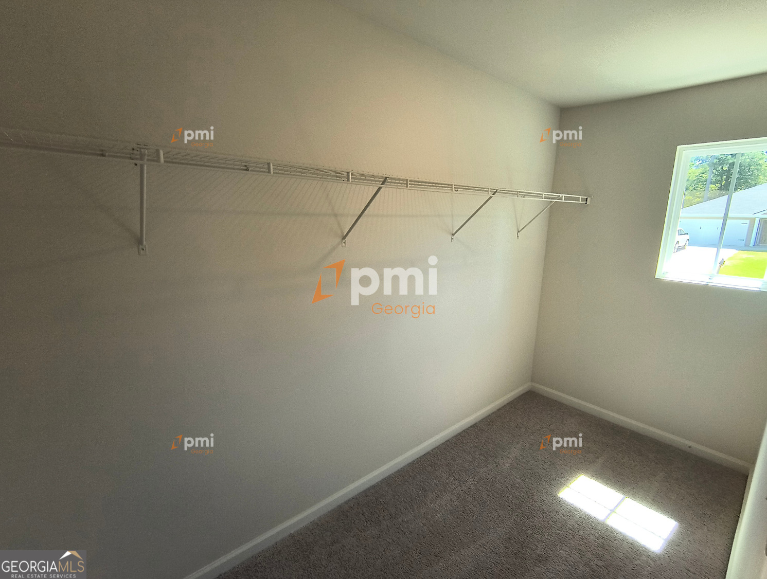 1552 Austin Drive Macon, GA 31217 - Photo 8 of 14 a view of a room with racks on the wall