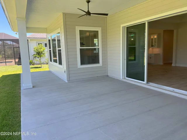 a view of an entryway with pool and door