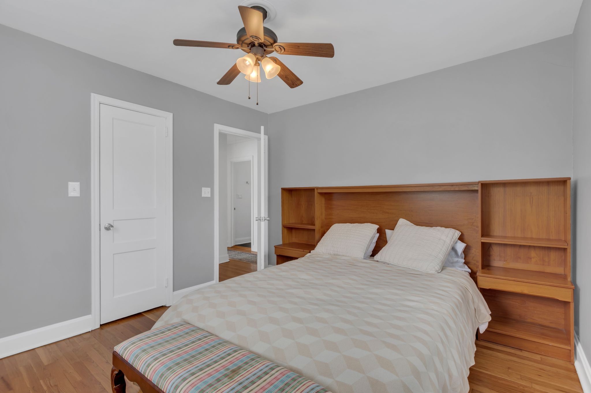 724 Dover Road Nashville, TN 37211 - Photo 21 of 32 a bedroom with a bed and wooden floor