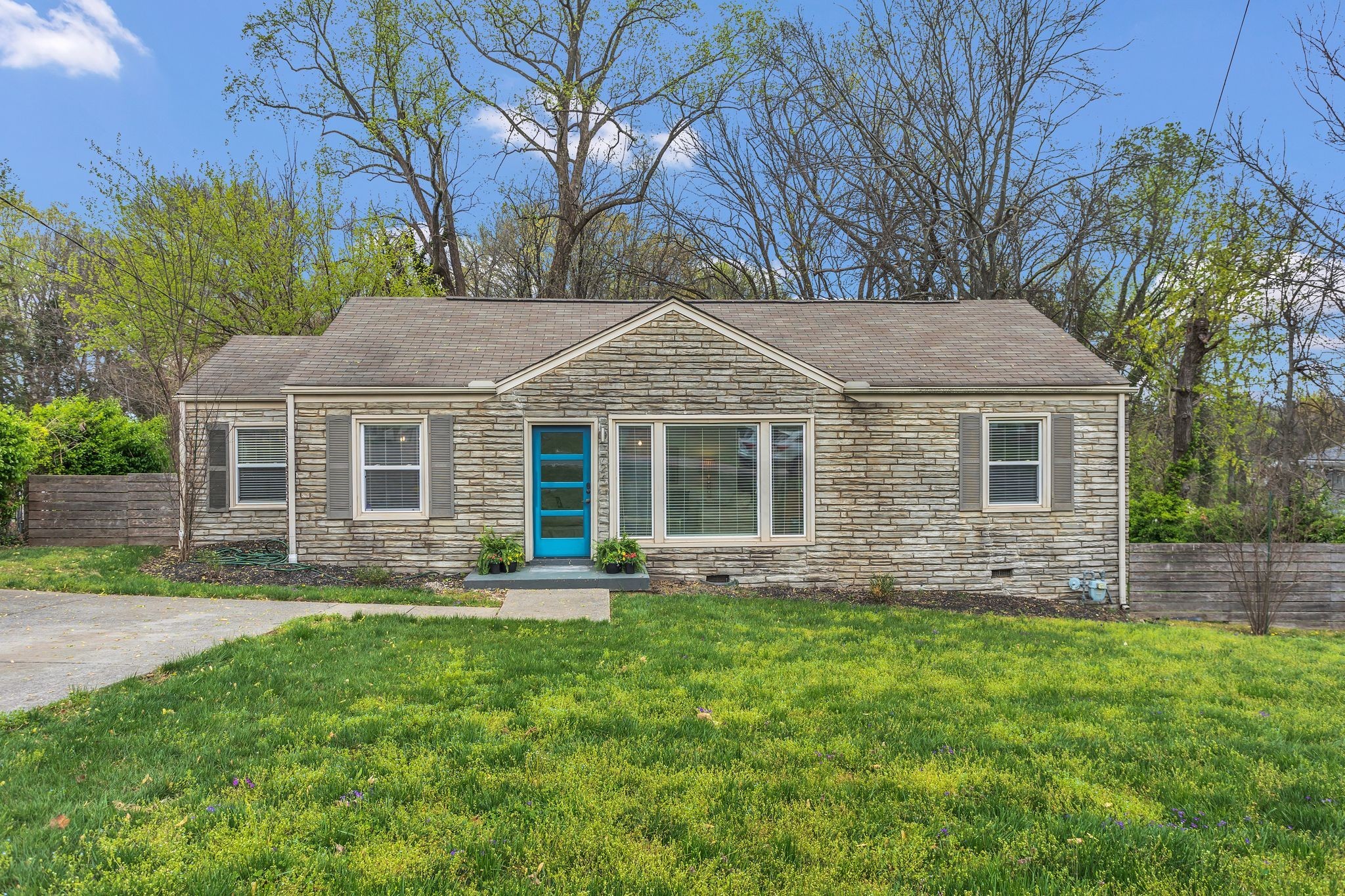 724 Dover Road Nashville, TN 37211 - Photo 3 of 32 a front view of a house with a yard