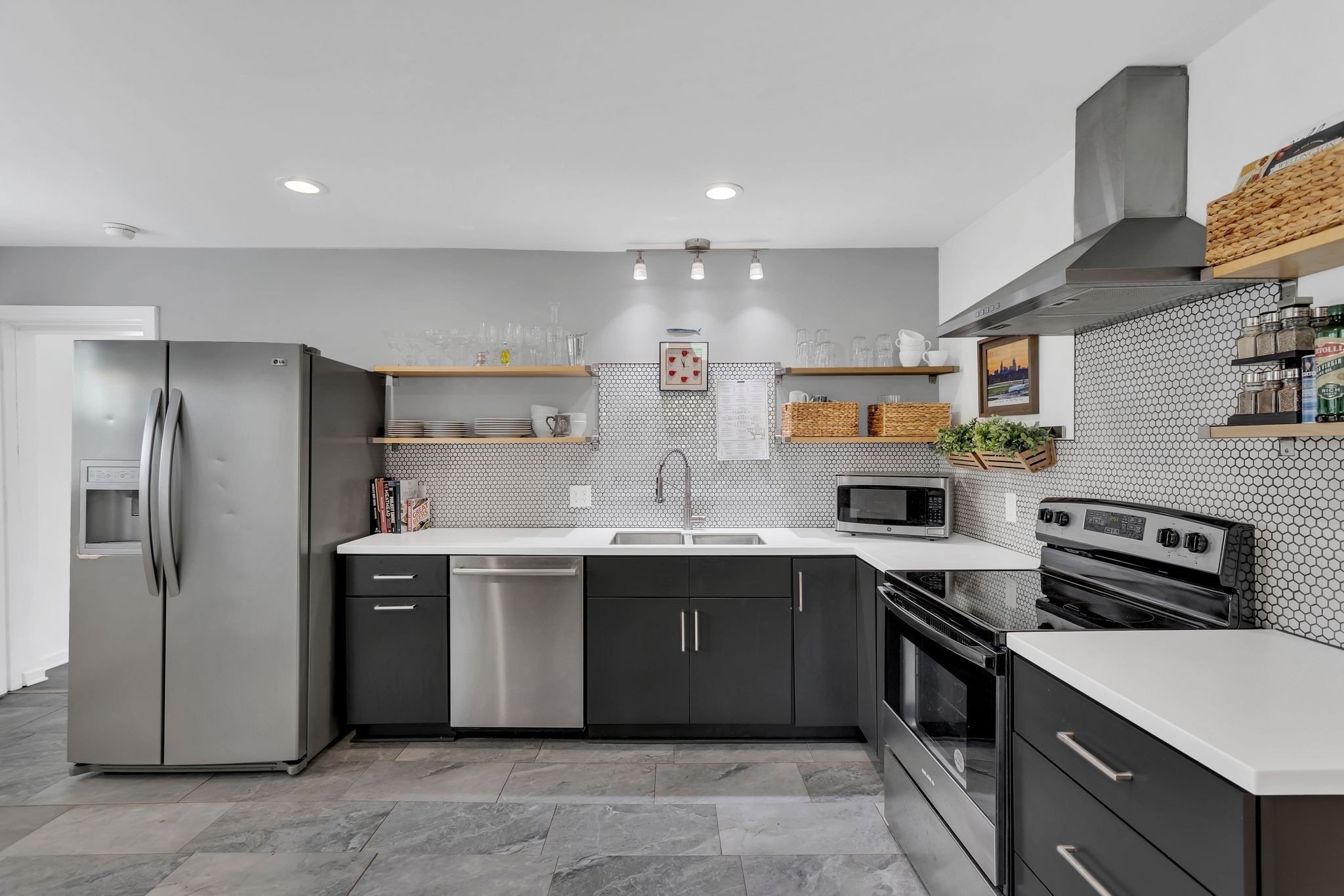 724 Dover Road Nashville, TN 37211 - Photo 10 of 32 a kitchen with stainless steel appliances granite countertop a sink stove and refrigerator
