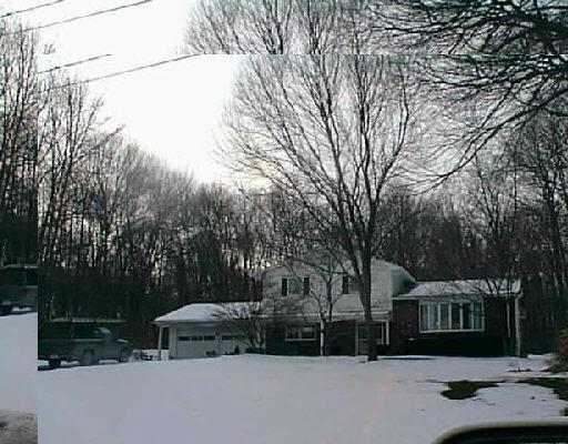 87 Sentry Hill Road Monroe, CT 06468 - Photo 1 of 1 a view of street with parked cars