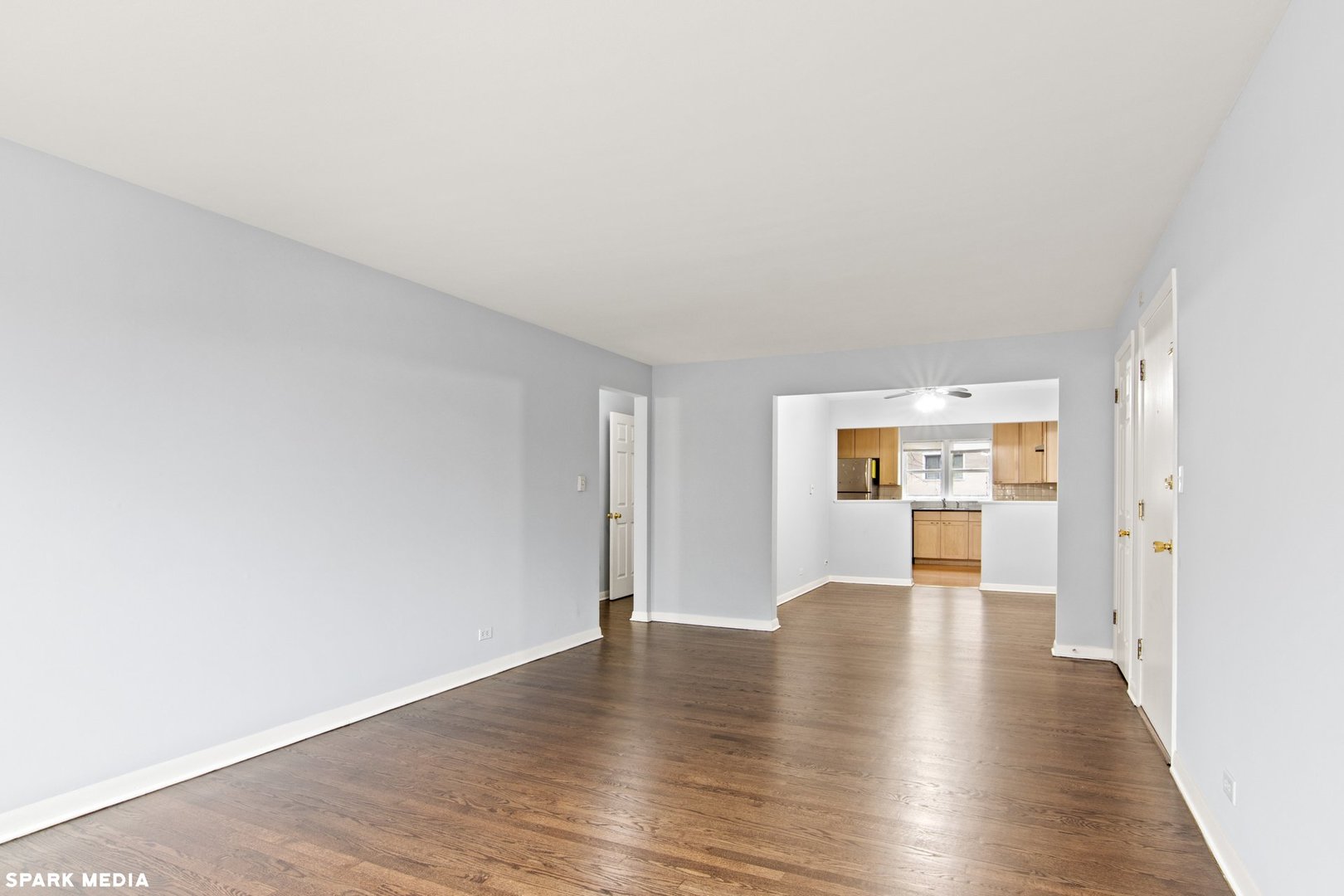 8847 La Crosse Avenue, Unit 204 Skokie, IL 60077 - Photo 3 of 16 a view of empty room with wooden floor