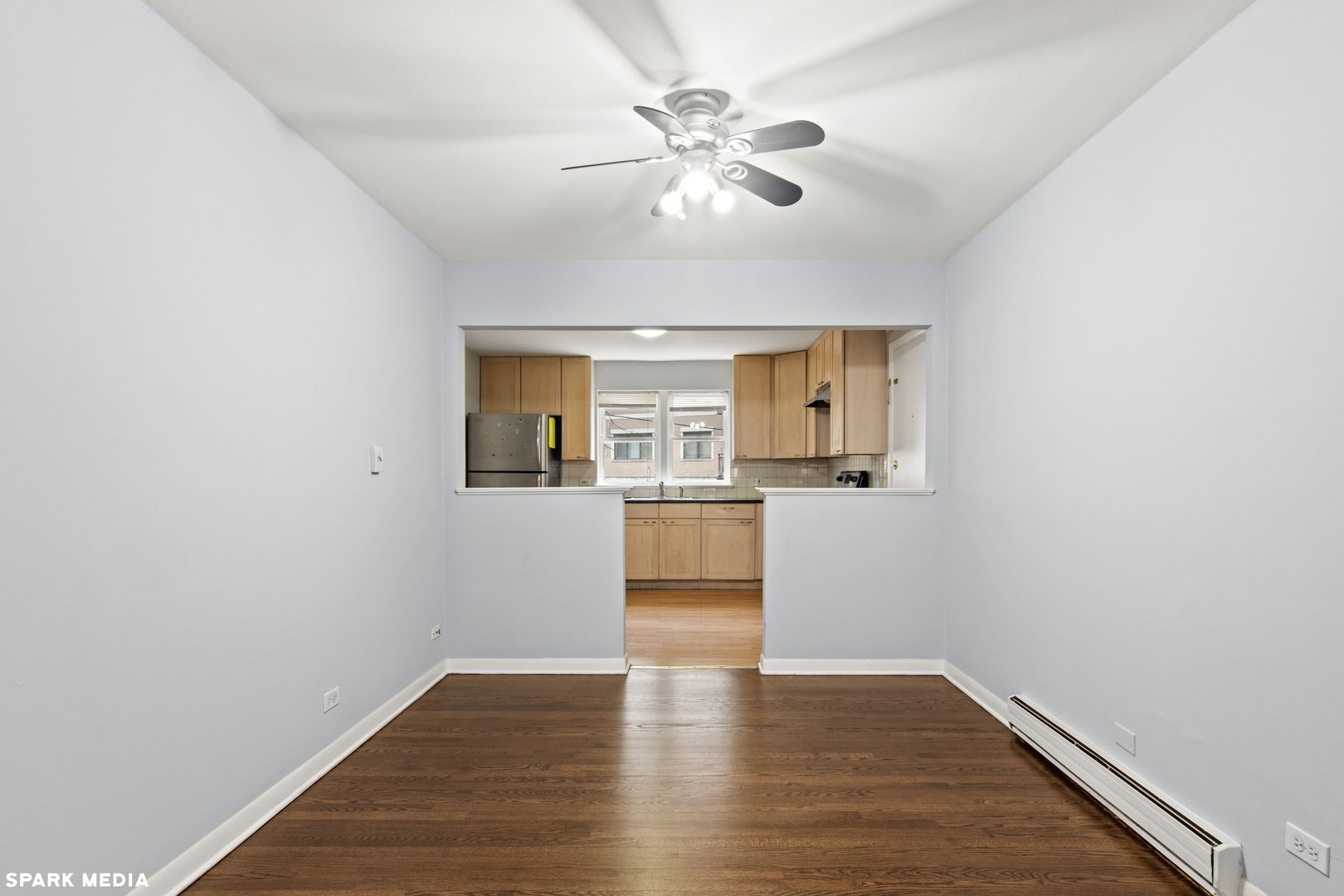 8847 La Crosse Avenue, Unit 204 Skokie, IL 60077 - Photo 6 of 16 wooden floor in an empty room with a window