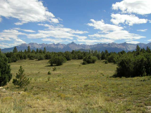 a view of a lake with mountains in the background