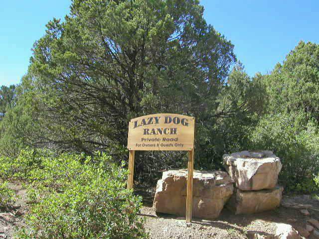 Lot#12 Mcclure Road Ridgway, CO 81432 - Photo 2 of 9 a sign that is sitting on a brick wall